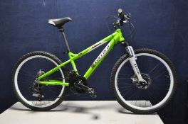 A CARRERA BLAST CHILDS MOUNTAIN BIKE with front suspension, front and rear disc brakes, 18speed SRAM