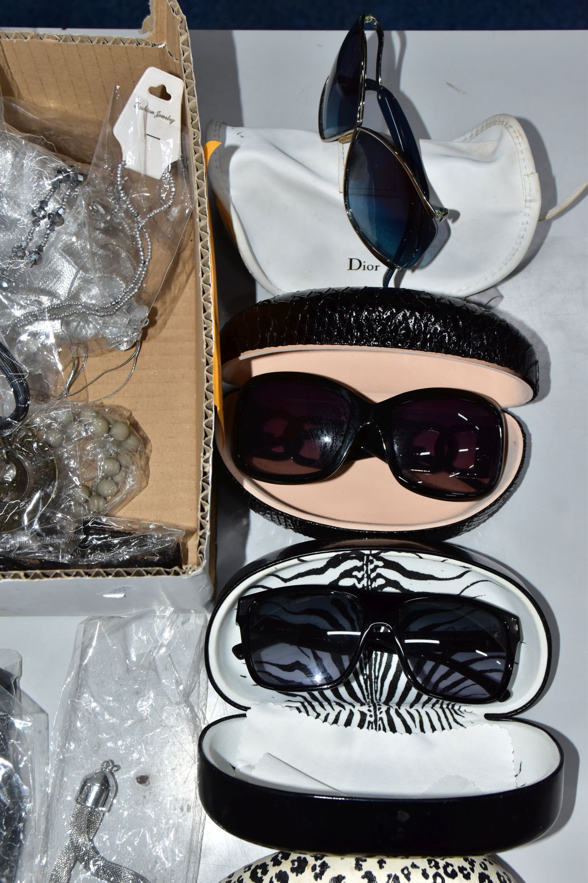 TWO BOXES OF COSTUME JEWELLERY AND SUNGLASSES, to include a box of assorted sunglasses in various - Image 5 of 6