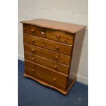 A MODERN PINE CHEST OF TWO SHORT OVER FOUR LONG DRAWERS, with serpentine top and base, width 95cm