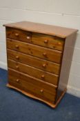 A MODERN PINE CHEST OF TWO SHORT OVER FOUR LONG DRAWERS, with serpentine top and base, width 95cm