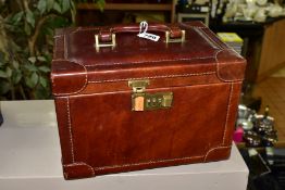 A 'THE BRIDGE' BROWN LEATHER VANITY CASE, with mirror to inside of lid and removable divider to