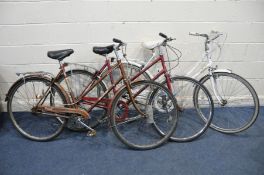 THREE VINTAGE LADIES BIKES including a white Raleigh Caprice, a brown Raleigh Transit and a Hercules