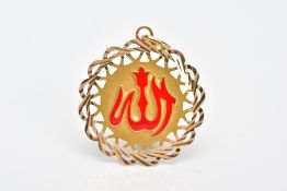 A YELLOW METAL PENDANT, of an oval form, red enamelled motif to the centre, openwork scallop