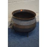 A VINTAGE COPPER AND IRON CAULDRON, with twin lion circular handles, diameter 34cm x height 30cm