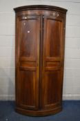 A GEORGIAN MAHOGANY FLOORSTANDING TWO DOOR CORNER CUPBOARD FRONTAGE, width 107cm x height 207cm