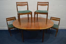 A MID 20TH CENTURY TEAK CIRCULAR EXTENDING DINING TABLE, with a single fold out leaf, on rectangular