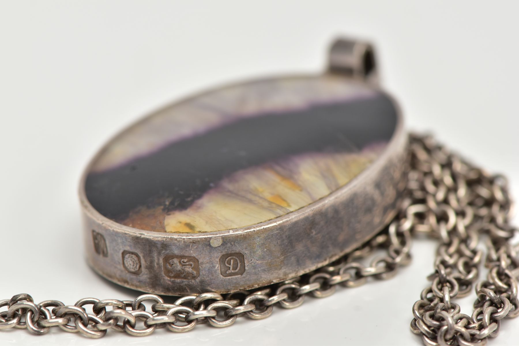 A SILVER PENDANT NECKLACE, the pendant of an oval form, one side set with blue john fluroite, the - Image 3 of 4