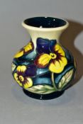 A SMALL BULBOUS MOORCROFT POTTERY VASE, Pansy Parade pattern, impressed backstamp and painted 2006