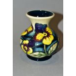 A SMALL BULBOUS MOORCROFT POTTERY VASE, Pansy Parade pattern, impressed backstamp and painted 2006