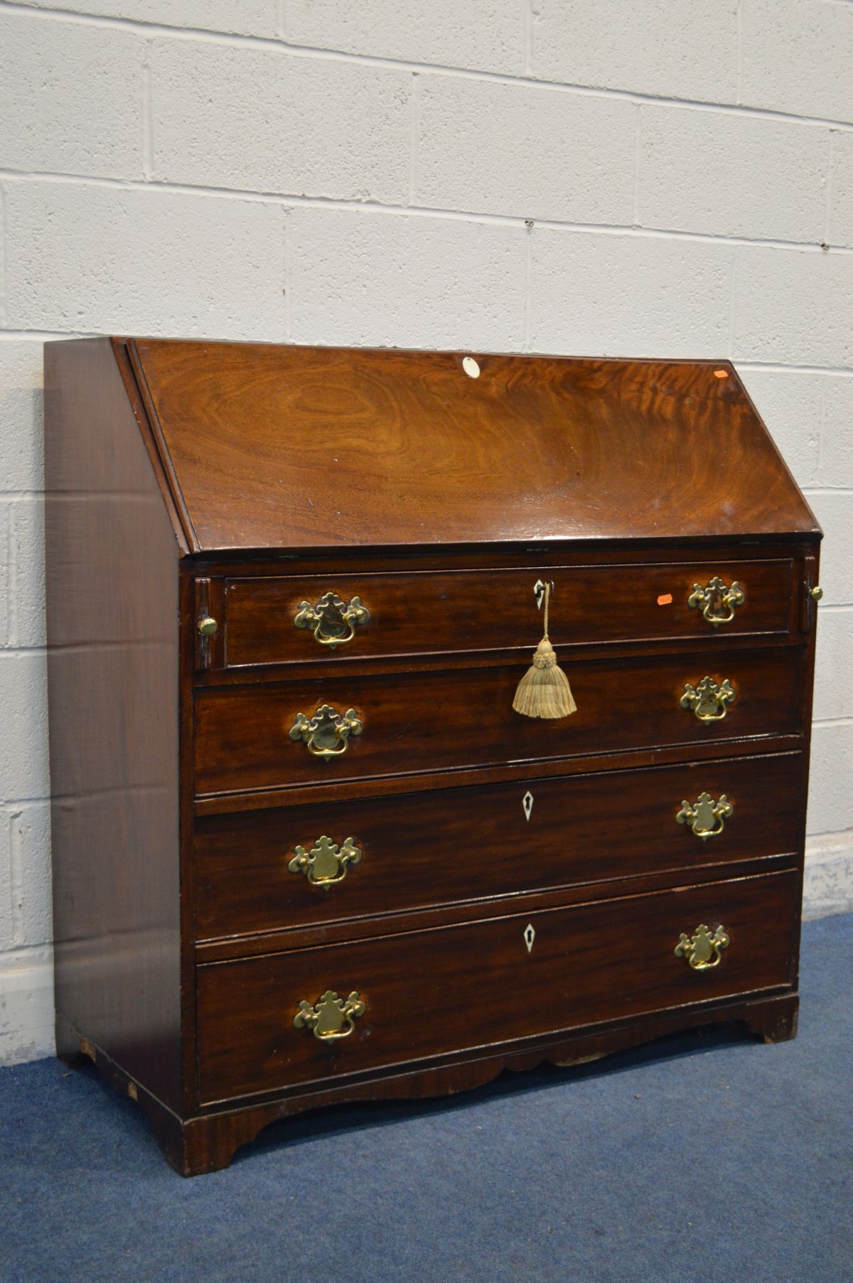 A GEORGIAN MAHOGANY BUREAU, with fitted interior comprising an assortment of satin birch drawer