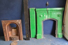 TWO VICTORIAN CAST IRON FIRE INSERTS the first is overpainted green with original mantel piece a