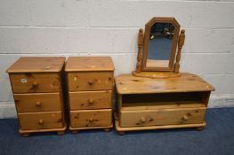 A PAIR OF PINE THREE DRAWER BEDSIDE CABINETS, along with a corner tv stand and a toilet mirror (4)
