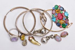 A BAG OF ASSORTED JEWELLERY, to include a silver hinged bangle of a crossover design, set with three
