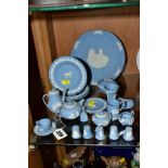 A COLLECTION OF WEDGWOOD PALE BLUE JASPERWARE INCLUDING MINIATURE PIECES, comprising miniature tea