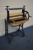 A VICTORIAN CAST IRON WASHING MANGLE