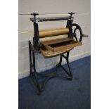 A VICTORIAN CAST IRON WASHING MANGLE