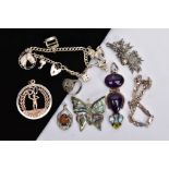 A BAG OF SILVER AND WHITE METAL ITEMS, to include a silver charm bracelet, suspending six charms