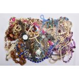 A BAG OF ASSORTED COSTUME JEWELLERY, to include imitation pearl necklaces, beaded necklaces,