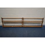 A PAIR OF ERCOL GOLDEN DAWN ELM TWO TIER HANGING PLATE RACKS, width 97cm