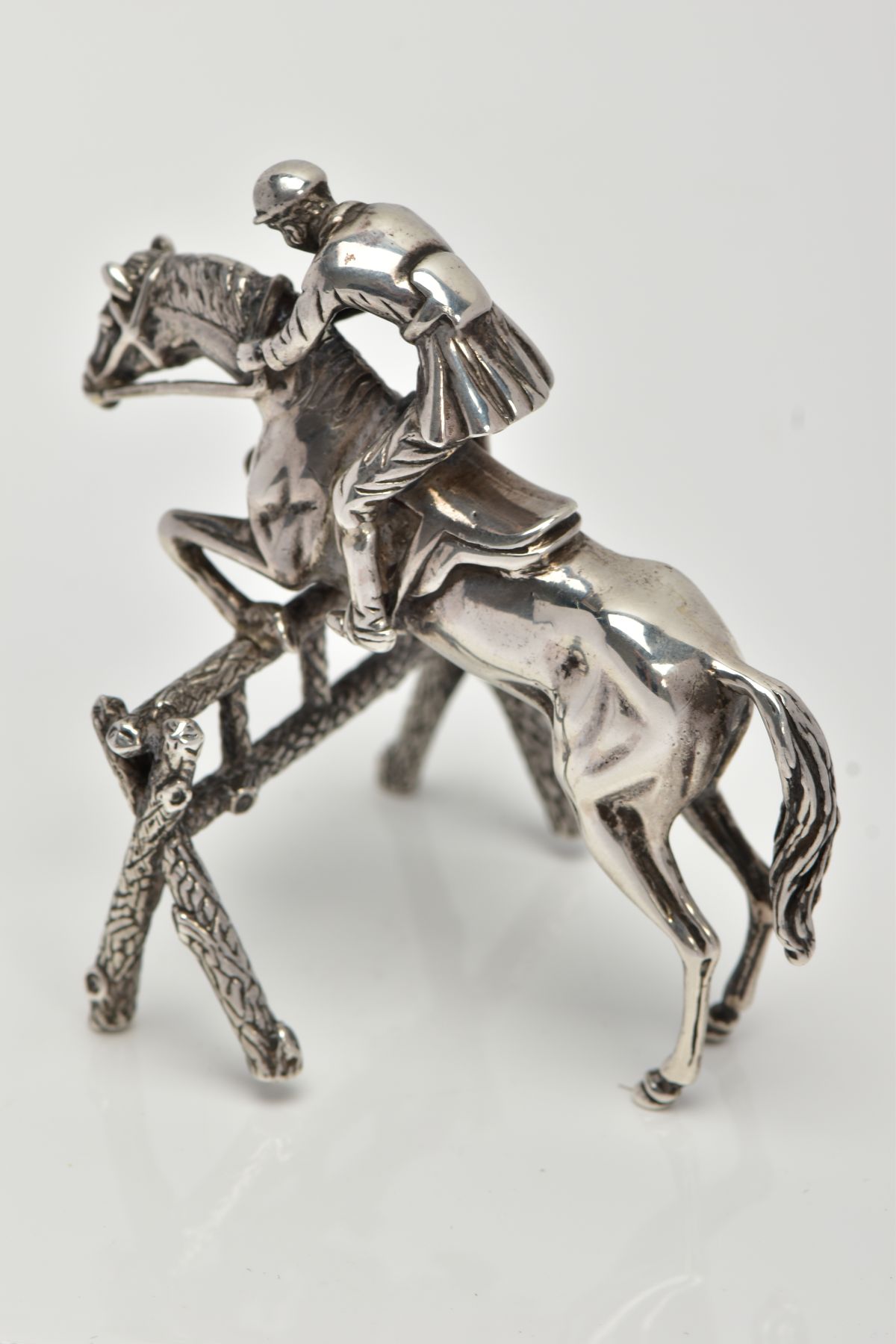 A SILVER SMALL HORSE AND JOCKEY ORNAMENT, measuring approximately 50mm in length x 70mm in height, - Image 5 of 7