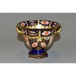 A SMALL ROYAL CROWN DERBY IMARI TWIN HANDLED URN, 4299 pattern, orange backstamp, height 7.5cm (