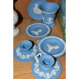 SIX WEDGWOOD BLUE JASPERWARE TRINKETS, comprising pair of dwarf candlesticks, a vase, height 8.5cm