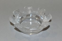 A LALIQUE ST NICHOLAS CLEAR AND FROSTED GLASS ASHTRAY/DISH, the crenellated rim moulded with eight