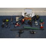 TWELVE VARIOUS FISHING REELS, to include a Dragon carp free runner 502 reel and three additional