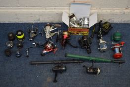 TWELVE VARIOUS FISHING REELS, to include a Dragon carp free runner 502 reel and three additional