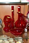A SMALL GROUP OF RED GLASSWARES, to include a jug, height 21.5cm, an oval shaped bowl, height 7cm,