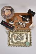 A SELECTION OF SILVER ITEMS, to include a cherub embossed EPNS tray, a circular white metal tray