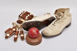 1930'S CRICKET MEMORABILIA, comprising of gloves, shoes and ball with wooden stand, the boots are