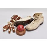 1930'S CRICKET MEMORABILIA, comprising of gloves, shoes and ball with wooden stand, the boots are