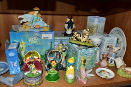 A GROUP OF DOULTON, BESWICK, ROYAL ALBERT, ETC, ORNAMENTS AND SNOW GLOBES, to include Royal Albert