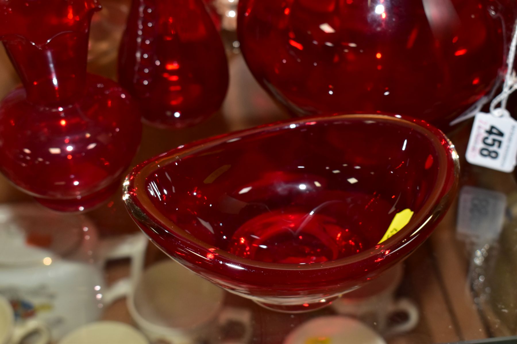 A SMALL GROUP OF RED GLASSWARES, to include a jug, height 21.5cm, an ...