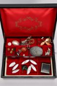 A JEWELLERY BOX WITH CONTENTS, black, red and gold detailed jewellery box, with contents such as a