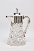 A GEORGE V SILVER CUT CRYSTAL WATER JUG WITH CYLINDRICAL INNER GLASS COOLER, plain polished silver