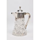 A GEORGE V SILVER CUT CRYSTAL WATER JUG WITH CYLINDRICAL INNER GLASS COOLER, plain polished silver