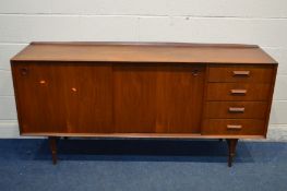 A MID 20TH CENTURY TEAK DANISH STYLE SIDEBOARD, raised back, double sliding doors with circular