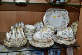 TWO FOLEY/COALPORT BONE CHINA PART TEA SETS, the Foley Somerset pattern comprises nine cups, eight