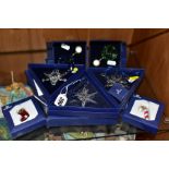 THREE BOXED SWAROVSKI CRYSTAL CHRISTMAS 'SNOWFLAKE' ORNAMENTS, 2005, 2006 and 2008, together with