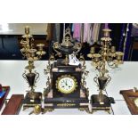 A LATE 19TH CENTURY BLACK SLATE, MARBLE AND GILT METAL CLOCK GARNITURE, the clock with urn shaped