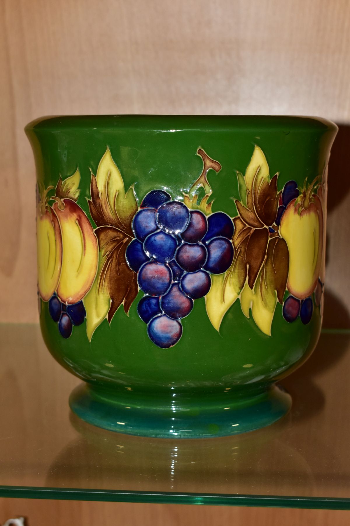 A MOORCROFT POTTERY JARDINIERE DECORATED IN THE FRUIT AND BERRIES PATTERN, on a green ground, - Image 4 of 6