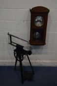 AN EARLY TO MID 20TH CENTURY OAK WALL CLOCK (winding key and pendulum) and a vintage Hobbies 'the