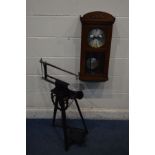 AN EARLY TO MID 20TH CENTURY OAK WALL CLOCK (winding key and pendulum) and a vintage Hobbies 'the