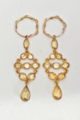 A PAIR OF YELLOW METAL CITRINE DROP EARRINGS, each with a yellow metal openwork drop set with
