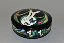 A MOORCROFT POTTERY COVERED BOWL, decorated with stylised birds and foliage by Nicola Slaney, signed