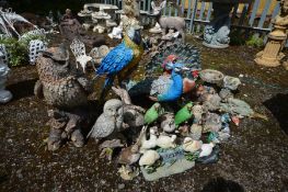 A LARGE COLLECTION OF PLASTIC GARDEN ORNAMENTS OF VARIOUS BIRDS, to include parrots, peacock,