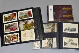 POSTCARDS AND PHOTOGRAPHS, two albums containing approximately three hundred postcards and greetings