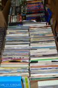 TWO BOXES OF SINGLE RECORDS AND DVD'S, the singles include approximately 350 7 inch and picture